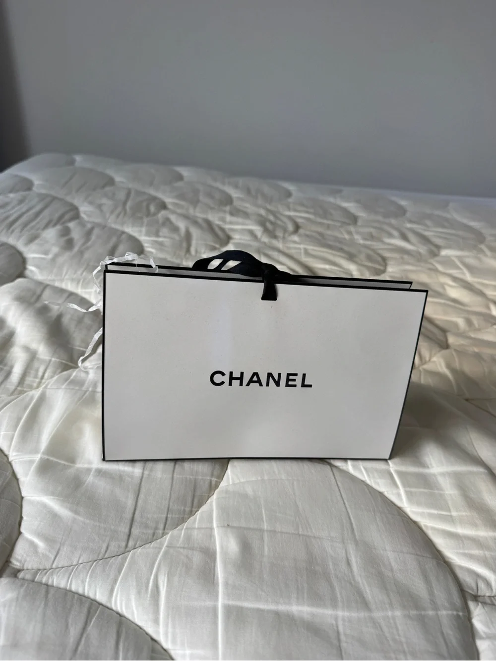 CHANEL White Tote-Style Gift Bag with Black Trim and Ribbon